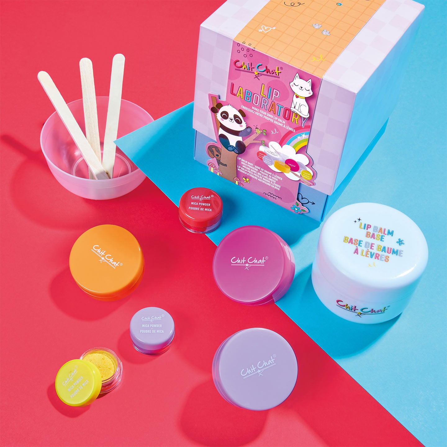 Colourful lip balm set with packaging on a red and blue background