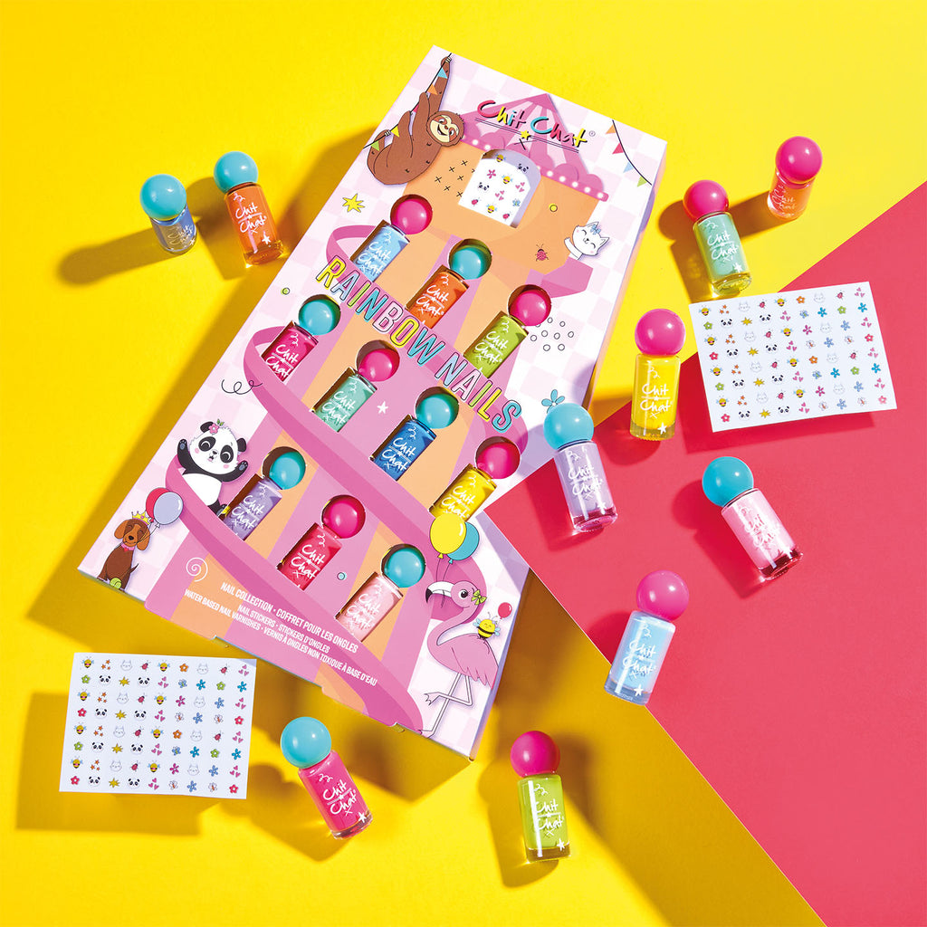 Colourful nail polish set with packaging on a yellow and pink background